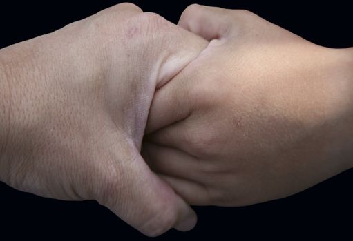 Mother and child sharing a handshake