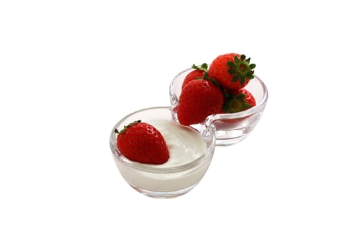 Strawberries with cream in double glass bowl isolated on white background