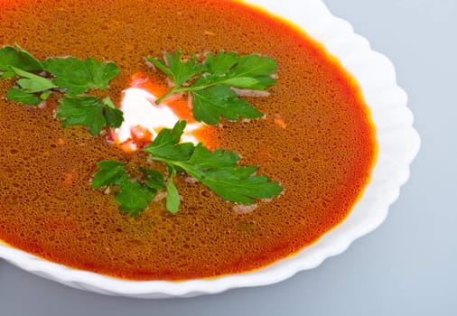 close-up soup from beet with sour cream and parsley