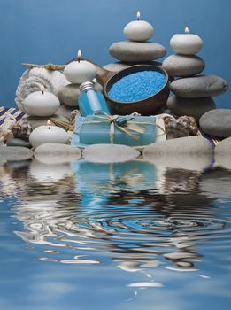 Spa background with hygiene and decorative items in blue.