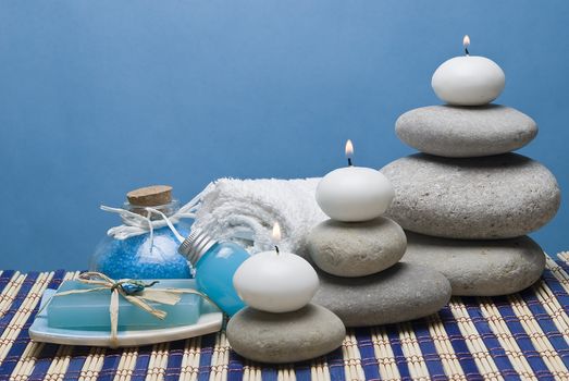 Spa background with hygiene and decorative items in blue.