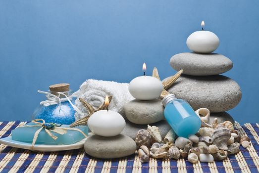 Spa background with hygiene and decorative items in blue.