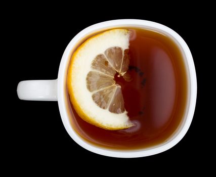 cup of tea with lemon, view from above, isolated on black