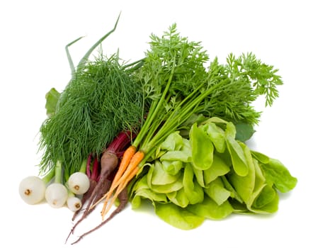 close-up heap of new vegetables, isolated on white