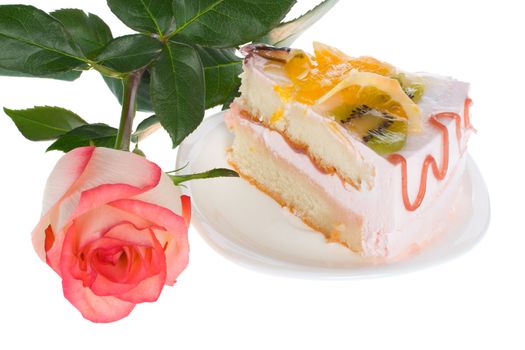 piece of cake and rose, isolated on white