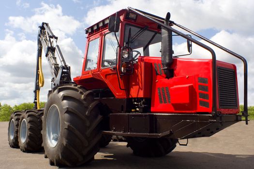 new red tractor for lumber industry