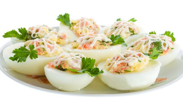 stuffed eggs with trout, isolated on white