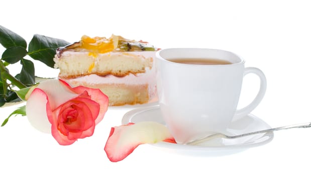 tea rose and cake, isolated on white