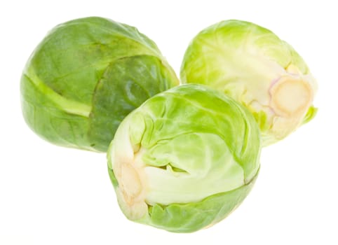 three brussels sprouts, isolated on white