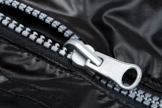 close-up zipper on black jacket