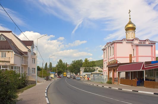 Street small town with houses and church, Krasnodar Region ,Russia.