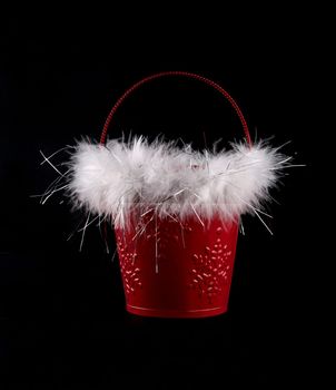 Holiday pail isolated on black background