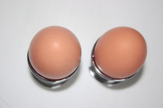 two eggs in egg cups taken from above