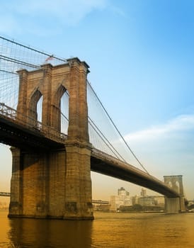 brooklyn bridge colored photo taken from manhattan