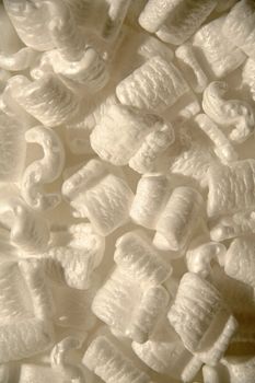 several white styrofoam packing peanuts close up shot