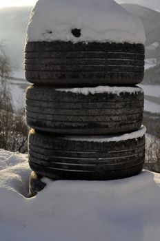 four tires in the snow