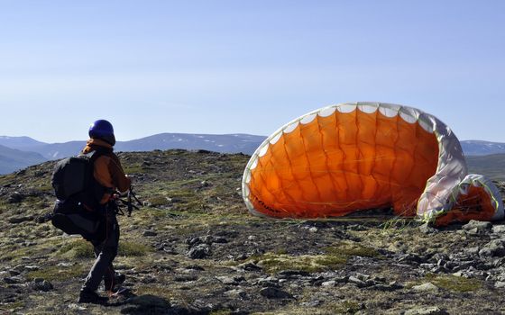 paraglider preparating to start