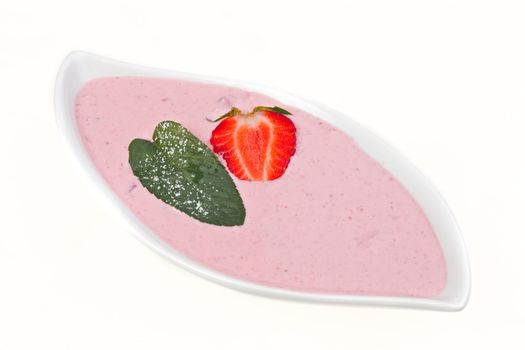 strawberry curd with a peppermint leaf