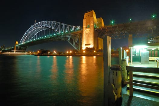 night photo of harbour bridge in sydney
