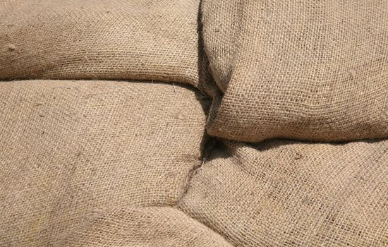 Four burlap bags make a natural texture background