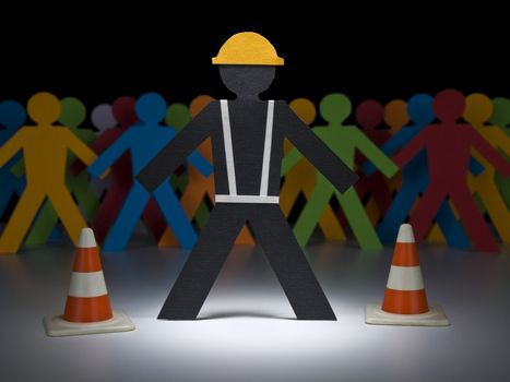 A paper construction worker stands under the spotlight before a multicolor crew.