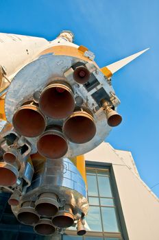 Russian Space Shuttle. Nozzles space rocket Soyuz. Close-up on a background of clear blue sky.