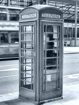 Traditional red telephone box in London, UK