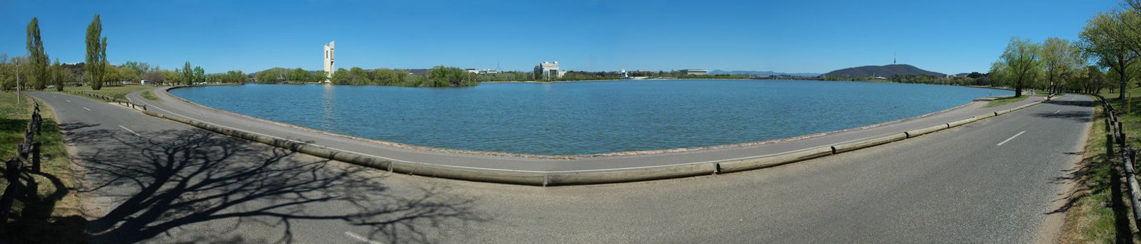 panorama photo of Lake Burley Griffin with National Carillon on Aspen Island in Canberra, Australia