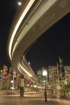 Night photo of Sydney monorail on Pyrmont Bridge, motion blur