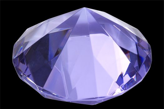 Blue diamond of glass - isolated on black background