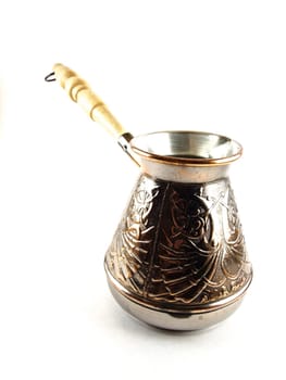 Copper coffee pot with wooden handle