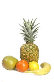 Mango, lemon, orange, banana and pineapple - isolated on white background