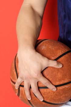 A man holding a basketball