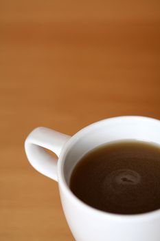 A cup of coffee on a table