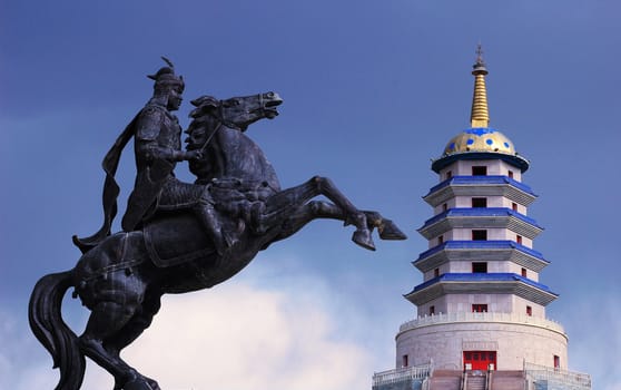 Statue of Mongolian saber and a Pagoda