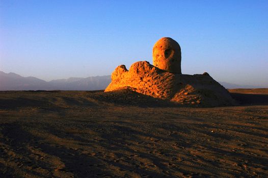 Relics of an ancient castle named Milan in the desert of Sinkiang at sunrise