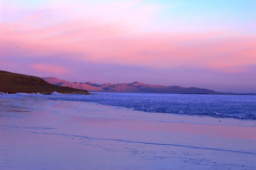 Landscape of lakeside at dusk in Tibet