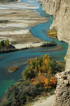 Landscape of a green river in autumn