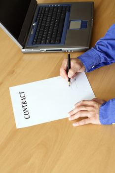 Businessman signing a contract