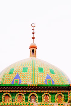 View of a colorful mosque roof on white background