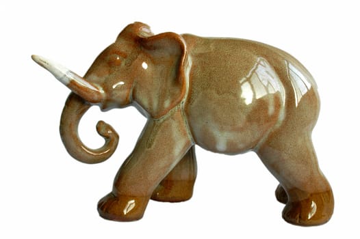 View of a porcelain elephant on white background