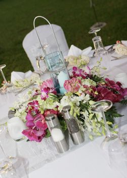 Tables decorated for a wedding reception.