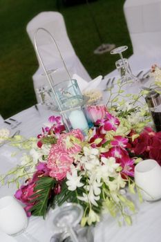 Tables decorated for a wedding reception.