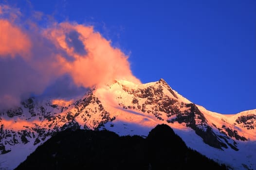 Landscape of snow mountains in the morning sunlight