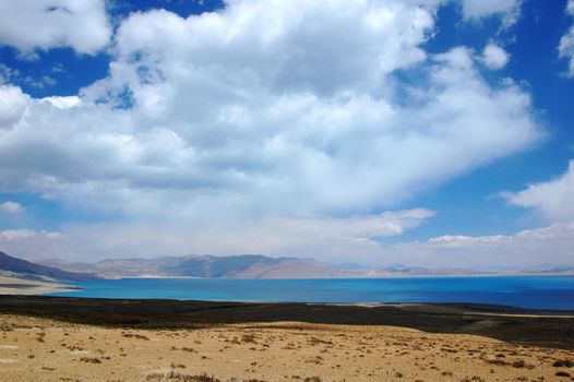 Landscape of mountains and lake in the highlands of Tibet