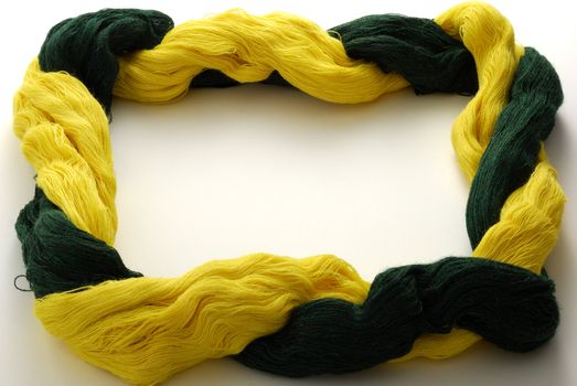 Bicolored yellow green knitting yarn in shape of frame