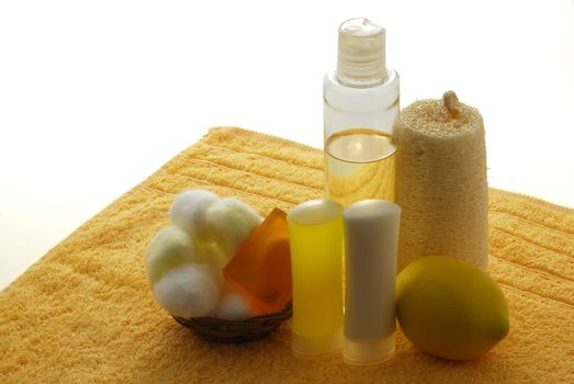 Lemon flavored SPA set including yellow towel, soap, moisturizer and cotton balls 