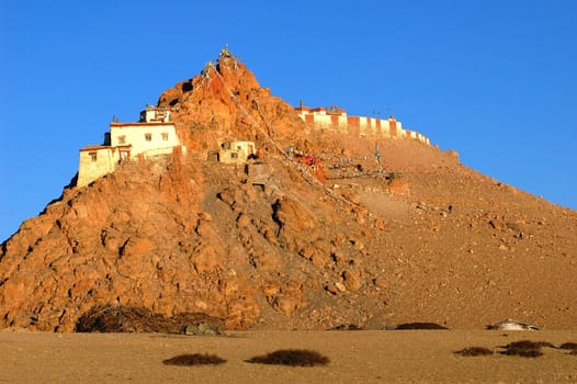 Landscape of small lamasery on the hills in Tibet