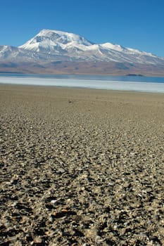 Landscape of snow mountains and blue lake in Tibet