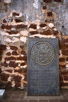 An ancient 17th century Dutch tombstone found at the ruins of St. Paul's Church, originally built by the Portuguese in 1521 at the UNESCO World Heritage site of Malacca, Malaysia.